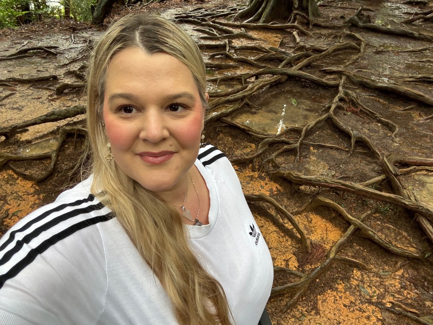 Sarah among the ancient tree roots on Mount Kurama